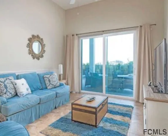 a bathroom with a granite countertop sink and a large mirror