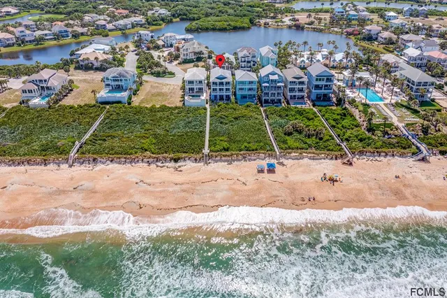front view of a house with a garden