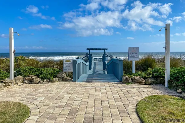 a view of a house with swimming pool