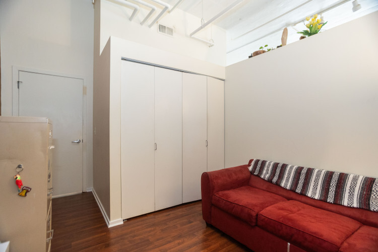 2323 West Pershing Road, Unit 140 Chicago, IL 60609 - Photo 15 of 18 a living room with furniture