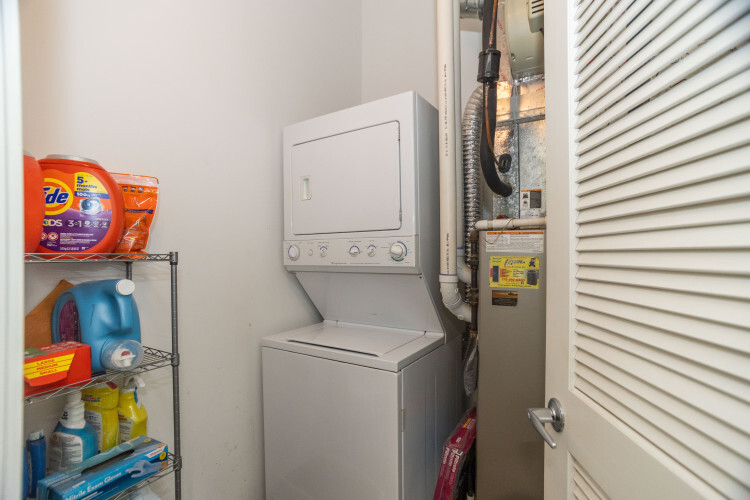 2323 West Pershing Road, Unit 140 Chicago, IL 60609 - Photo 17 of 18 a utility room with dryer and washer