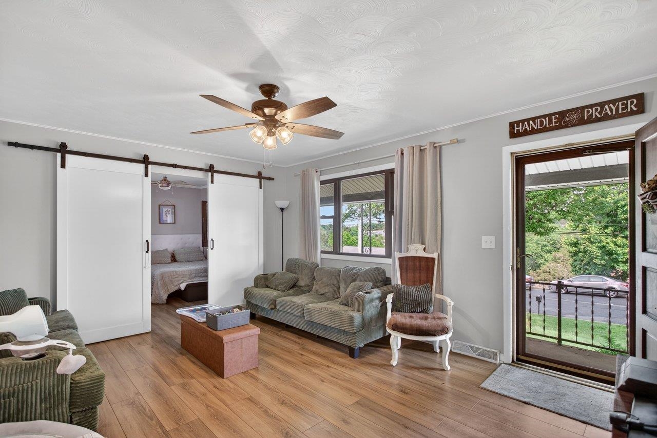 220 Rockingham Drive Harrisonburg, VA 22802 - Photo 5 of 40 a living room with furniture and a window