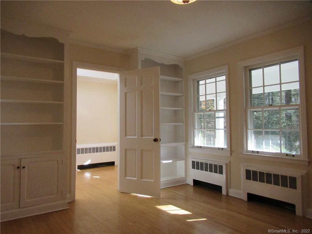 11 Burnt Swamp Road Woodbridge, CT 06525 - Photo 13 of 29 a view of a bedroom with furniture and windows