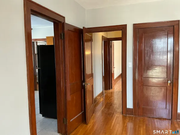 a view of a living room with a flat screen tv