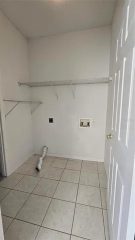 a view of a room with white racks