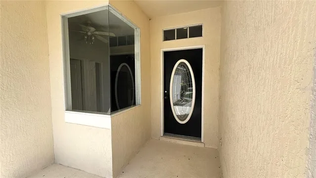 a view of a hallway with washer and dryer