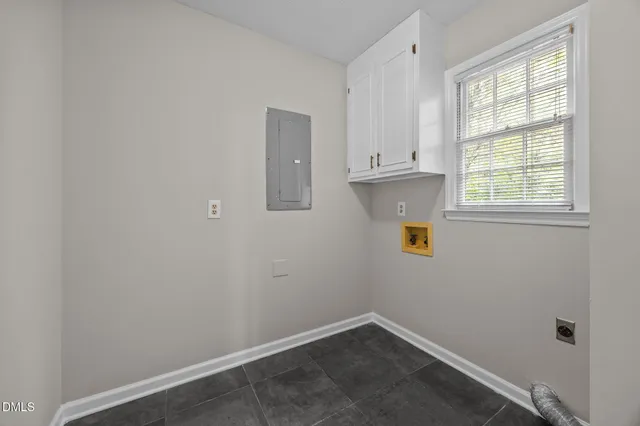 an empty room with window