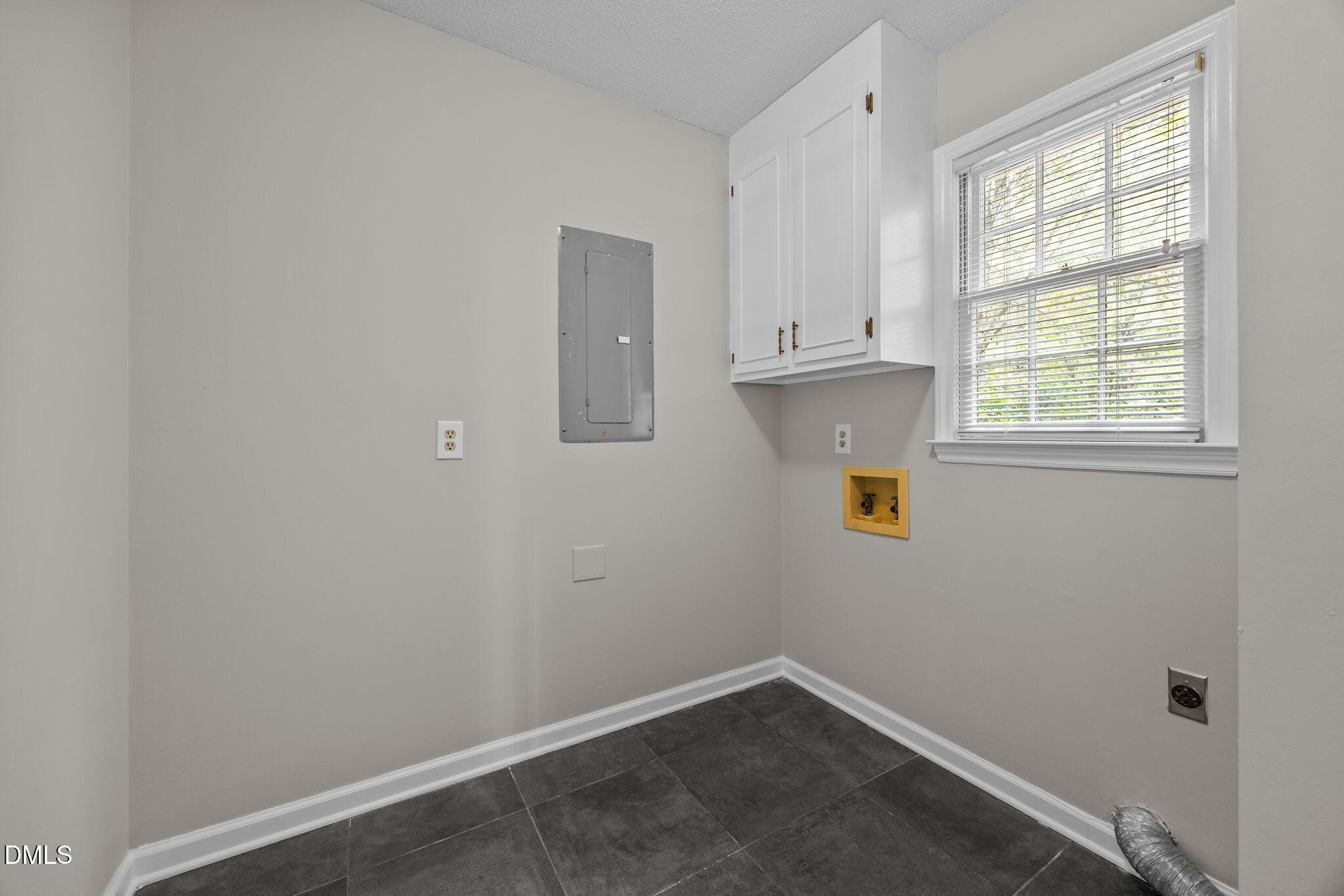 8405 Bells Lake Road Apex, NC 27539 - Photo 15 of 44 an empty room with window