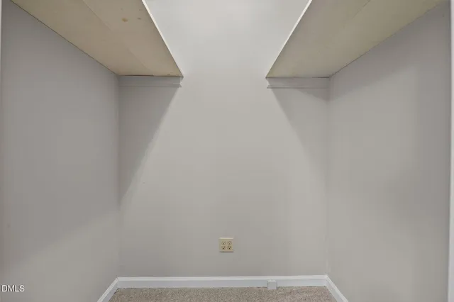 a view of small space with racks on the wall