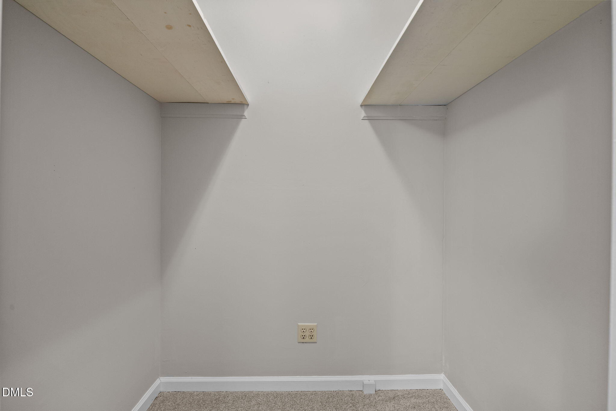 8405 Bells Lake Road Apex, NC 27539 - Photo 19 of 44 a view of small space with racks on the wall