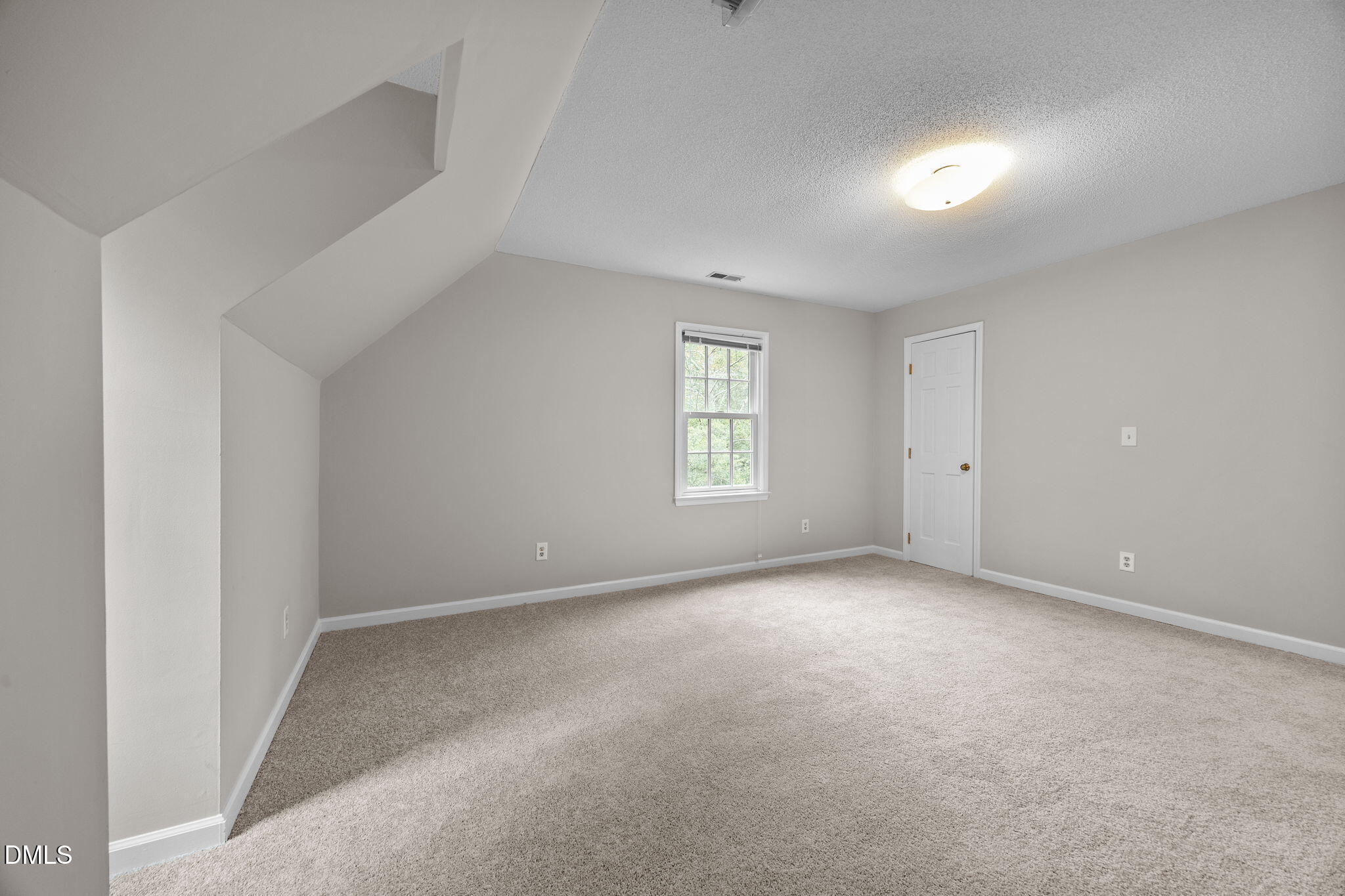 8405 Bells Lake Road Apex, NC 27539 - Photo 22 of 44 an empty room with windows