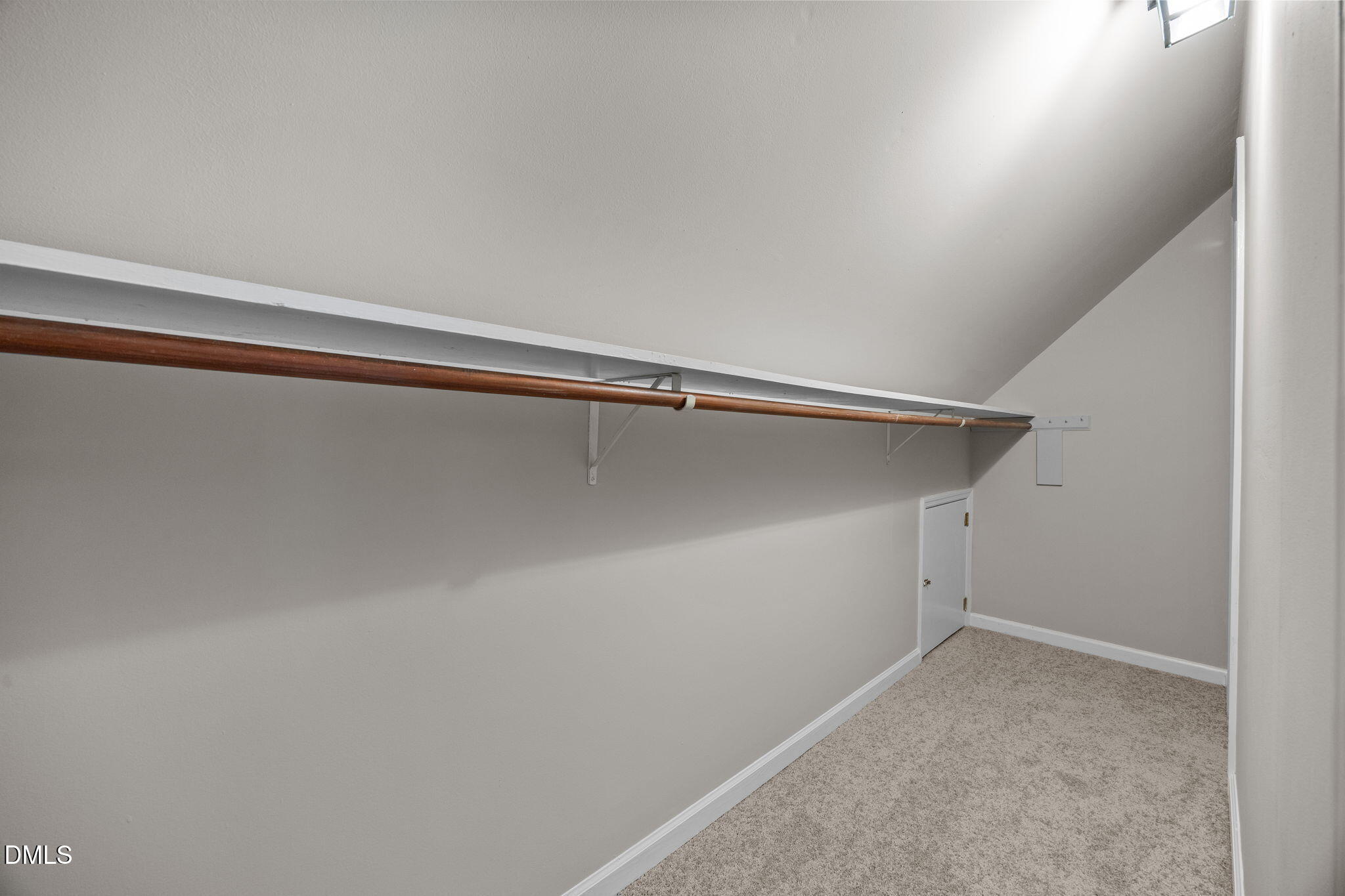 8405 Bells Lake Road Apex, NC 27539 - Photo 23 of 44 a view of a room with an empty space