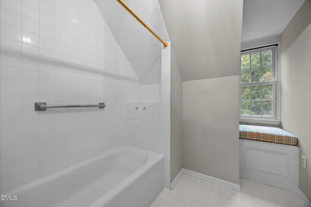 a bathroom with a bathtub