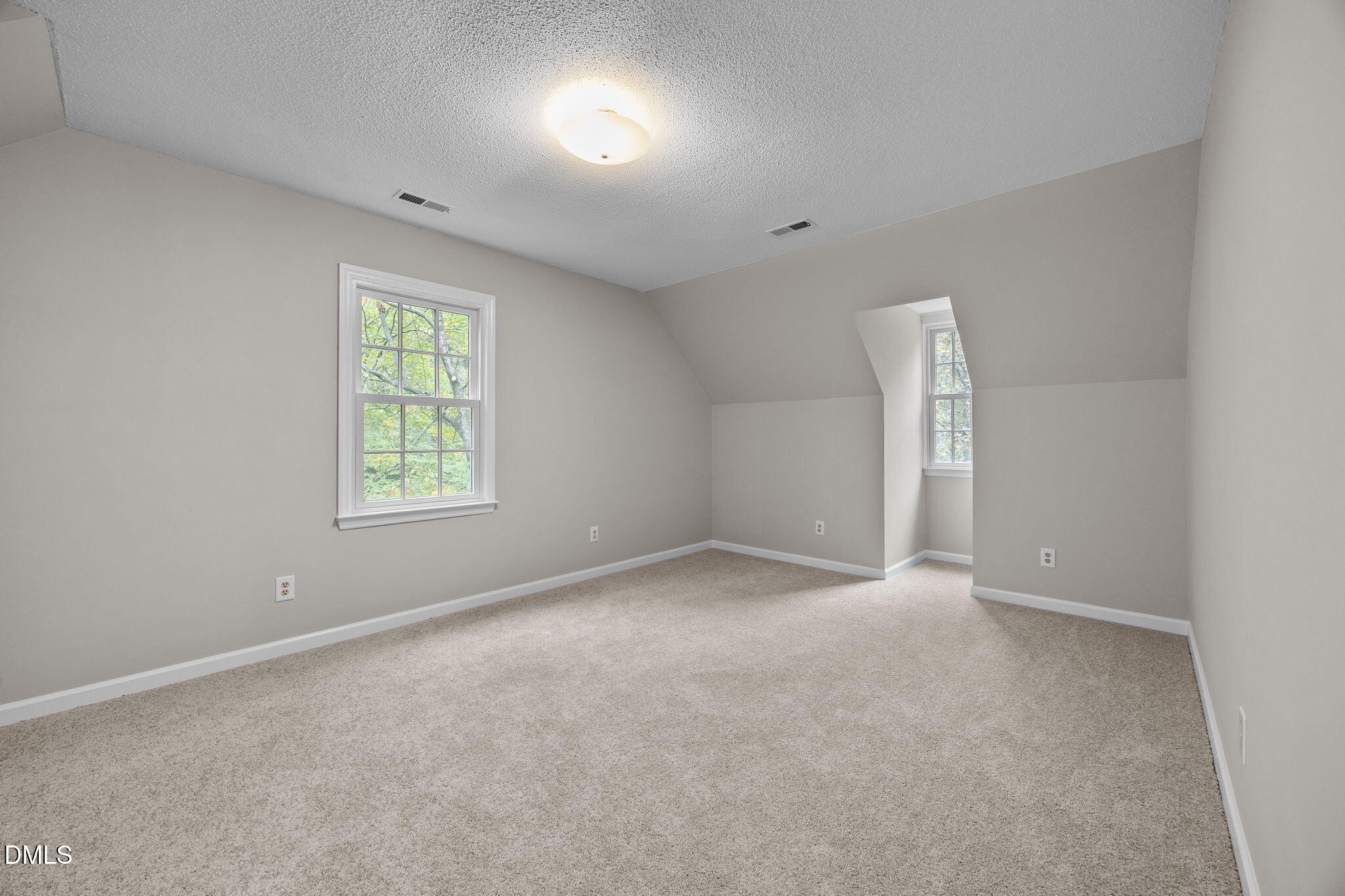 8405 Bells Lake Road Apex, NC 27539 - Photo 26 of 44 an empty room with windows