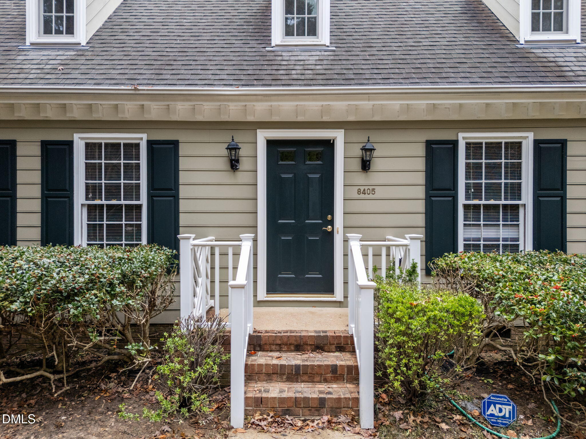 8405 Bells Lake Road Apex, NC 27539 - Photo 3 of 44 front view of a brick house many windows