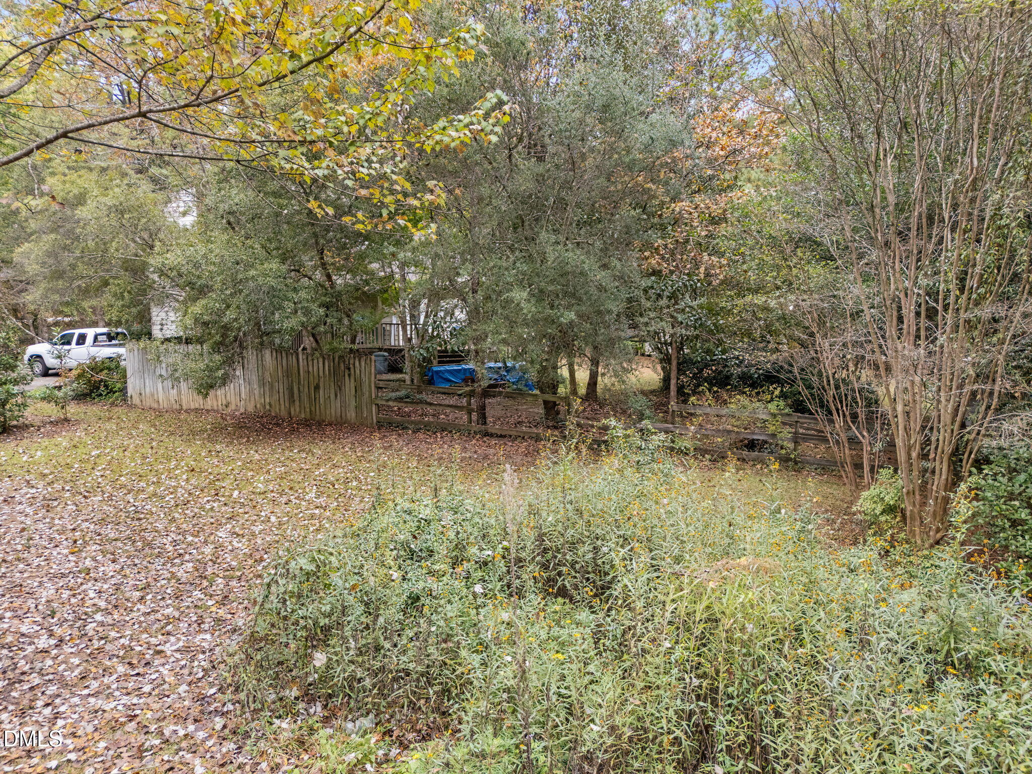 8405 Bells Lake Road Apex, NC 27539 - Photo 40 of 44 a view of a backyard with sitting area