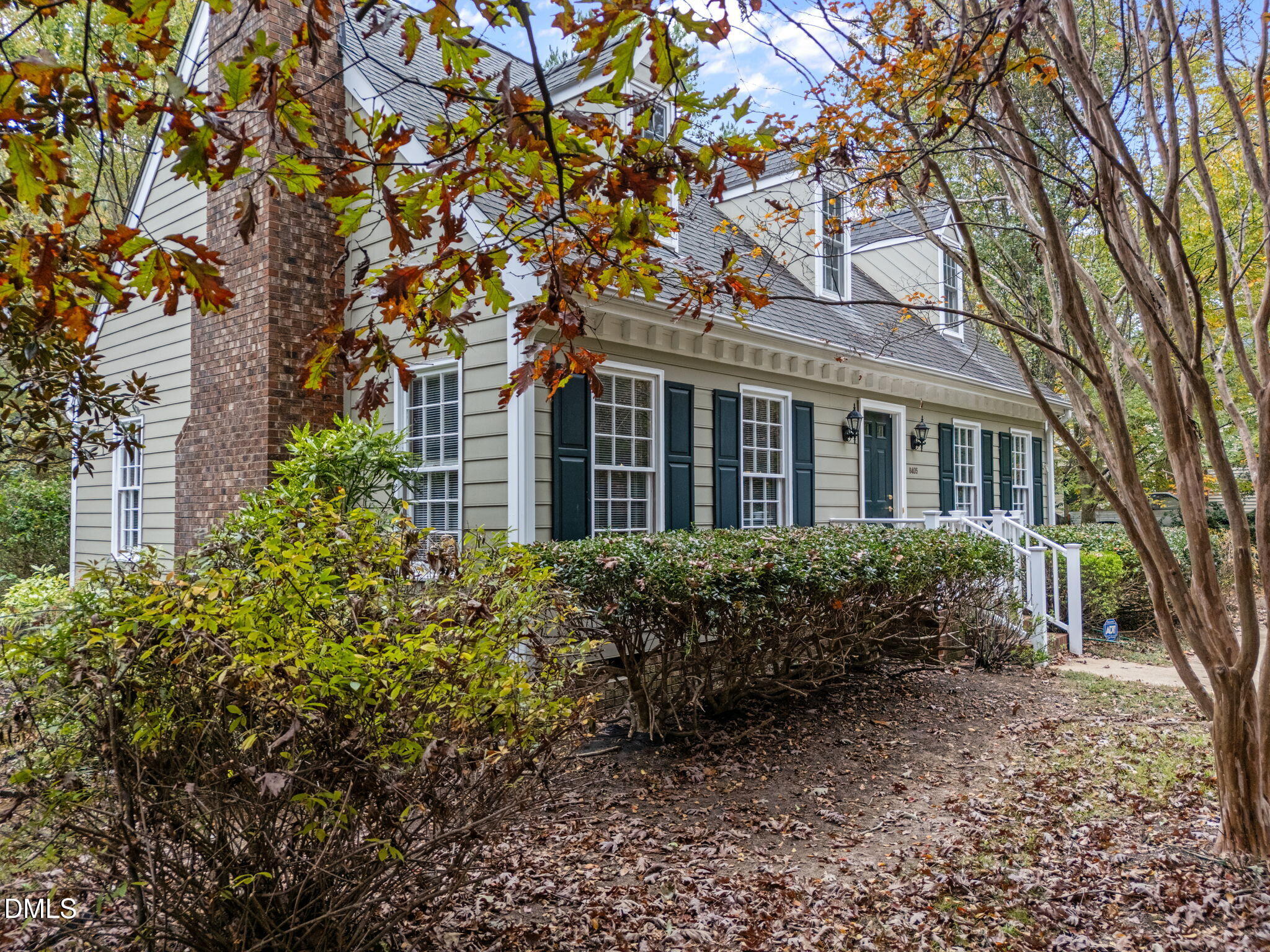 8405 Bells Lake Road Apex, NC 27539 - Photo 4 of 44 front view of a house with a garden