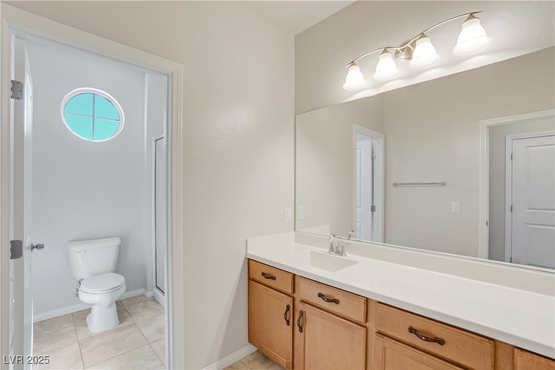 1145 Strada Pecei Henderson, NV 89011 - Photo 40 of 61 Full bath with vanity and tile patterned flooring