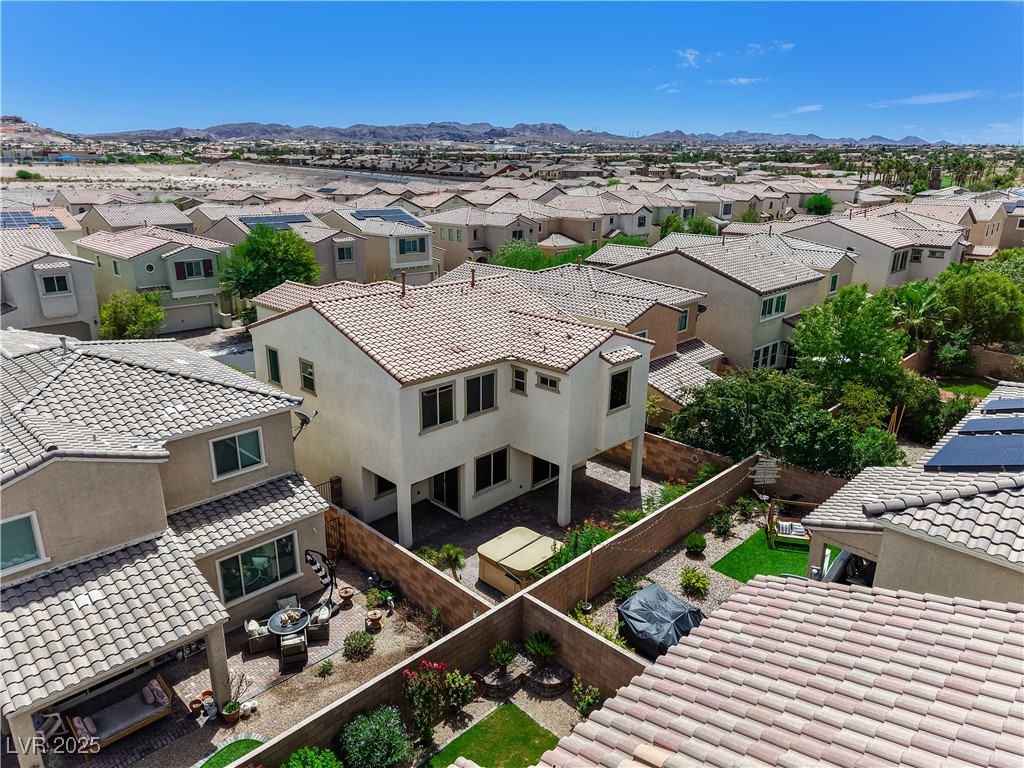 1145 Strada Pecei Henderson, NV 89011 - Photo 50 of 61 Aerial view of residential area featuring a mountain backdrop