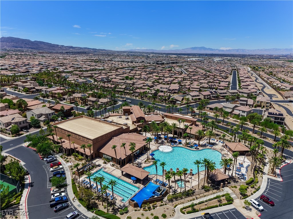 1145 Strada Pecei Henderson, NV 89011 - Photo 54 of 61 Aerial perspective of suburban area featuring a mountainous background