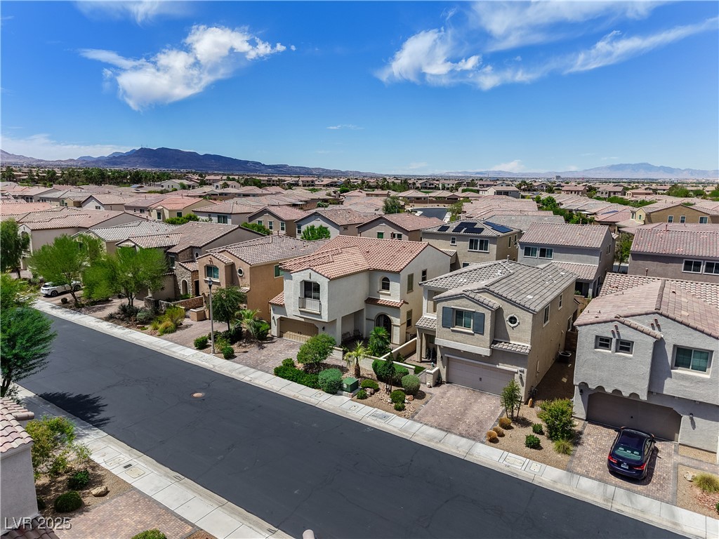 1145 Strada Pecei Henderson, NV 89011 - Photo 60 of 61 Aerial view of residential area with a mountainous background