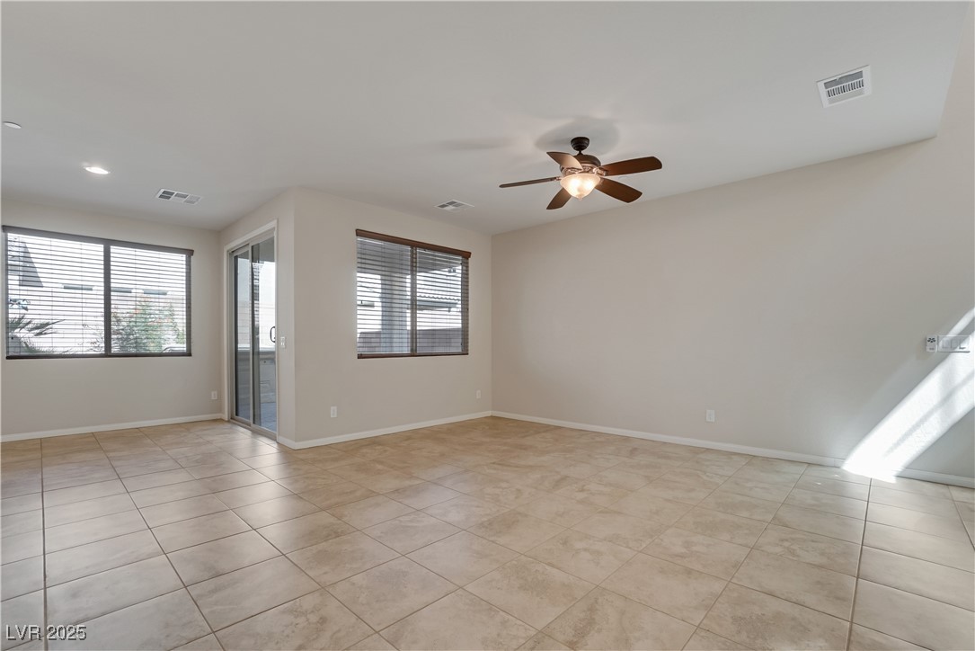 1145 Strada Pecei Henderson, NV 89011 - Photo 9 of 61 Unfurnished room with ceiling fan and light tile patterned floors