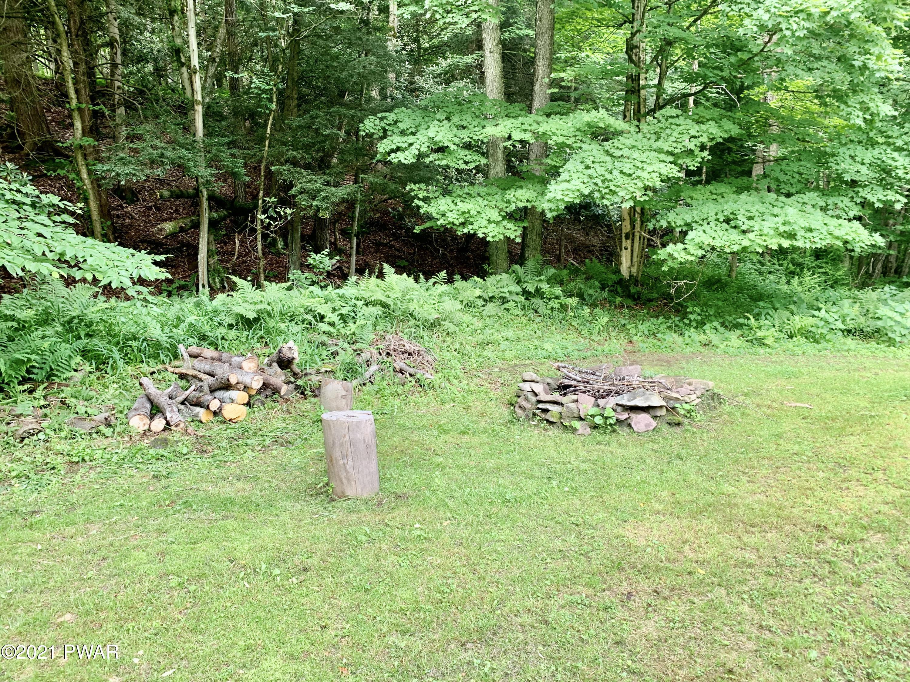 619 A Prompton Road Prompton, PA 18456 - Photo 40 of 50 BACK YARD FIRE PITT