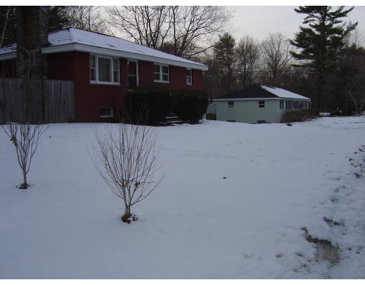 5 Leslie Road Rowley, MA 01969 - Photo 5 of 6 a view of a house with a yard