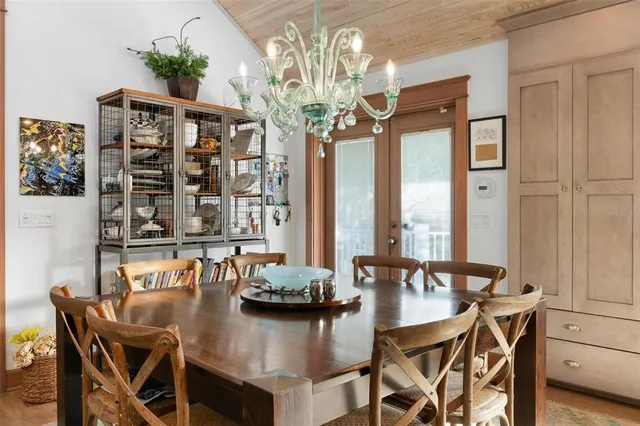 a bathroom with a granite countertop toilet sink and mirror