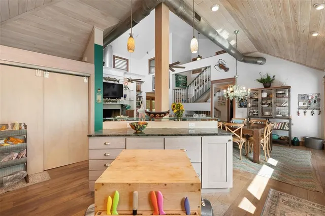 a view of a swimming pool with outdoor seating and plants
