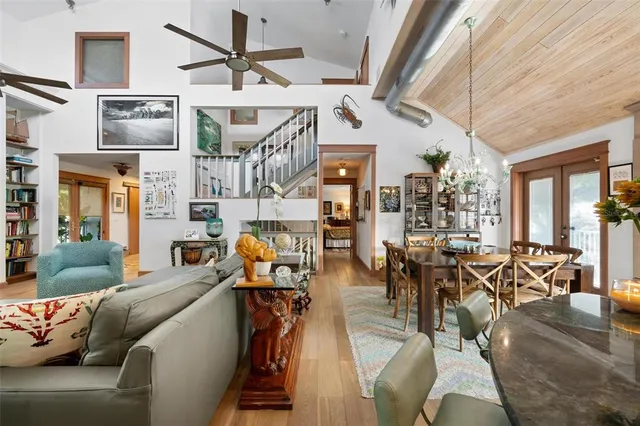 a kitchen with stainless steel appliances granite countertop a stove and cabinets