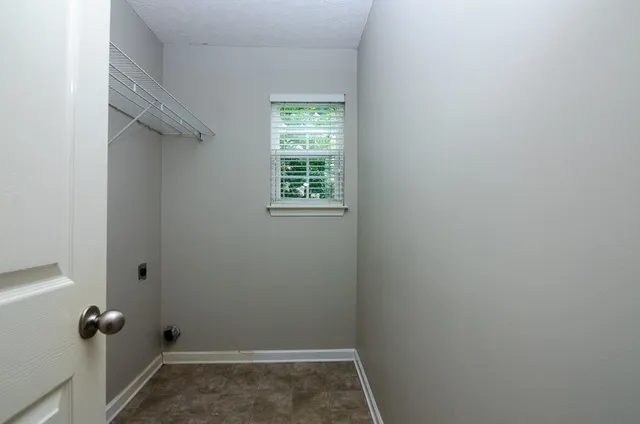 a bathroom with a sink a toilet a mirror and a bathtub