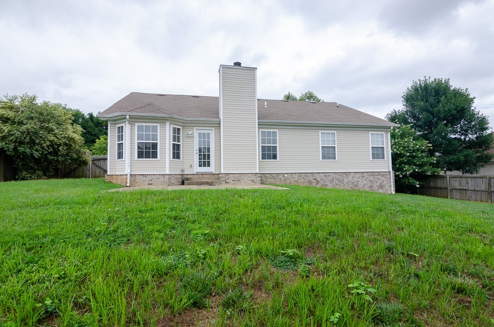 1912 Portview Drive Spring Hill, TN 37174 - Photo 19 of 20 a front view of house with yard and green space