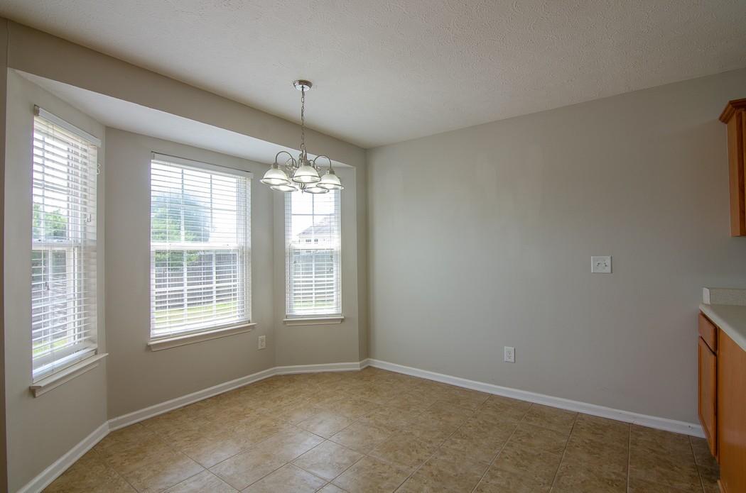 1912 Portview Drive Spring Hill, TN 37174 - Photo 6 of 20 a view of an empty room with a window