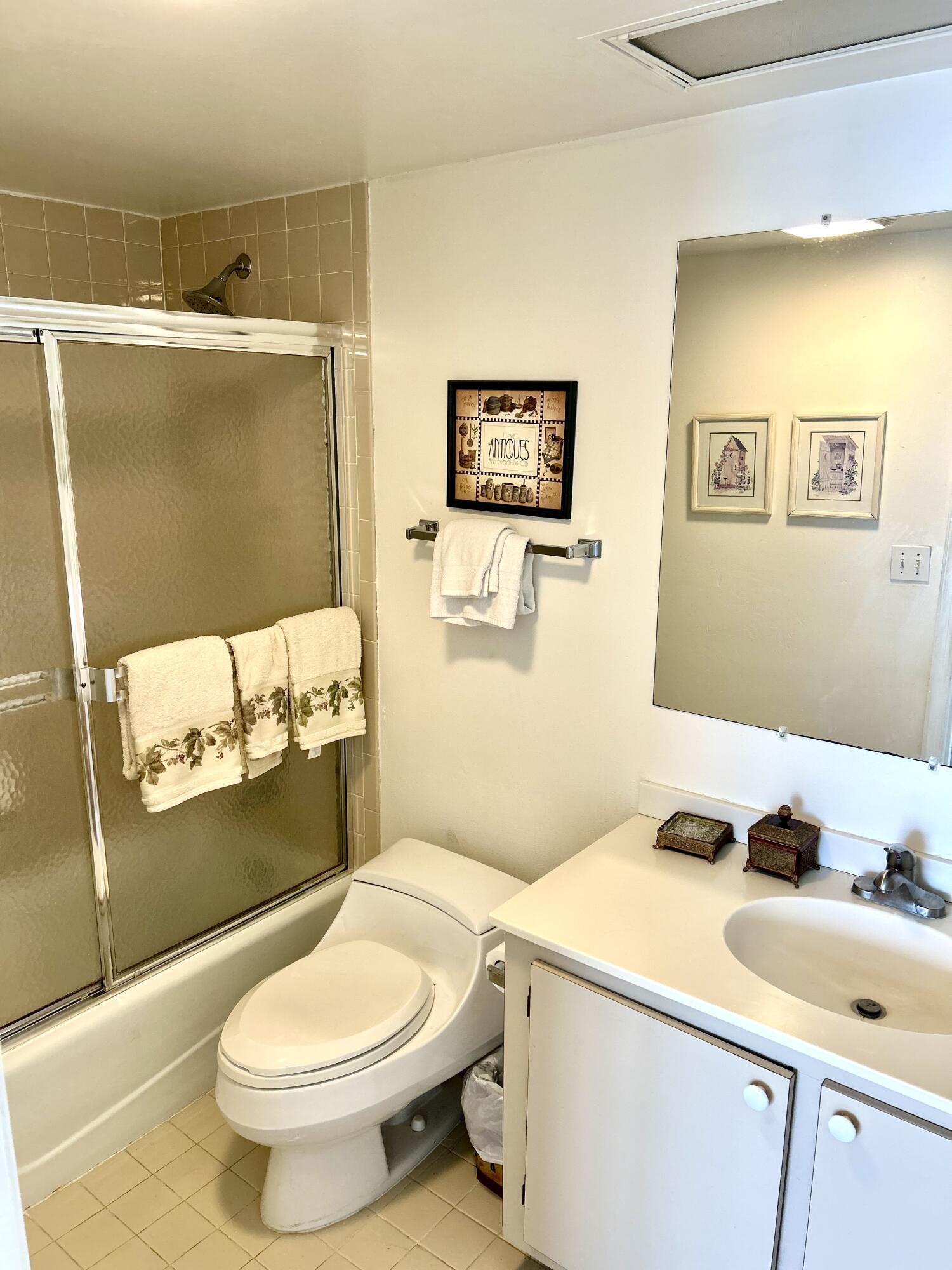 13321 Polo Club Road, Unit C 202 Wellington, FL 33414 - Photo 11 of 20 a bathroom with a sink and a toilet