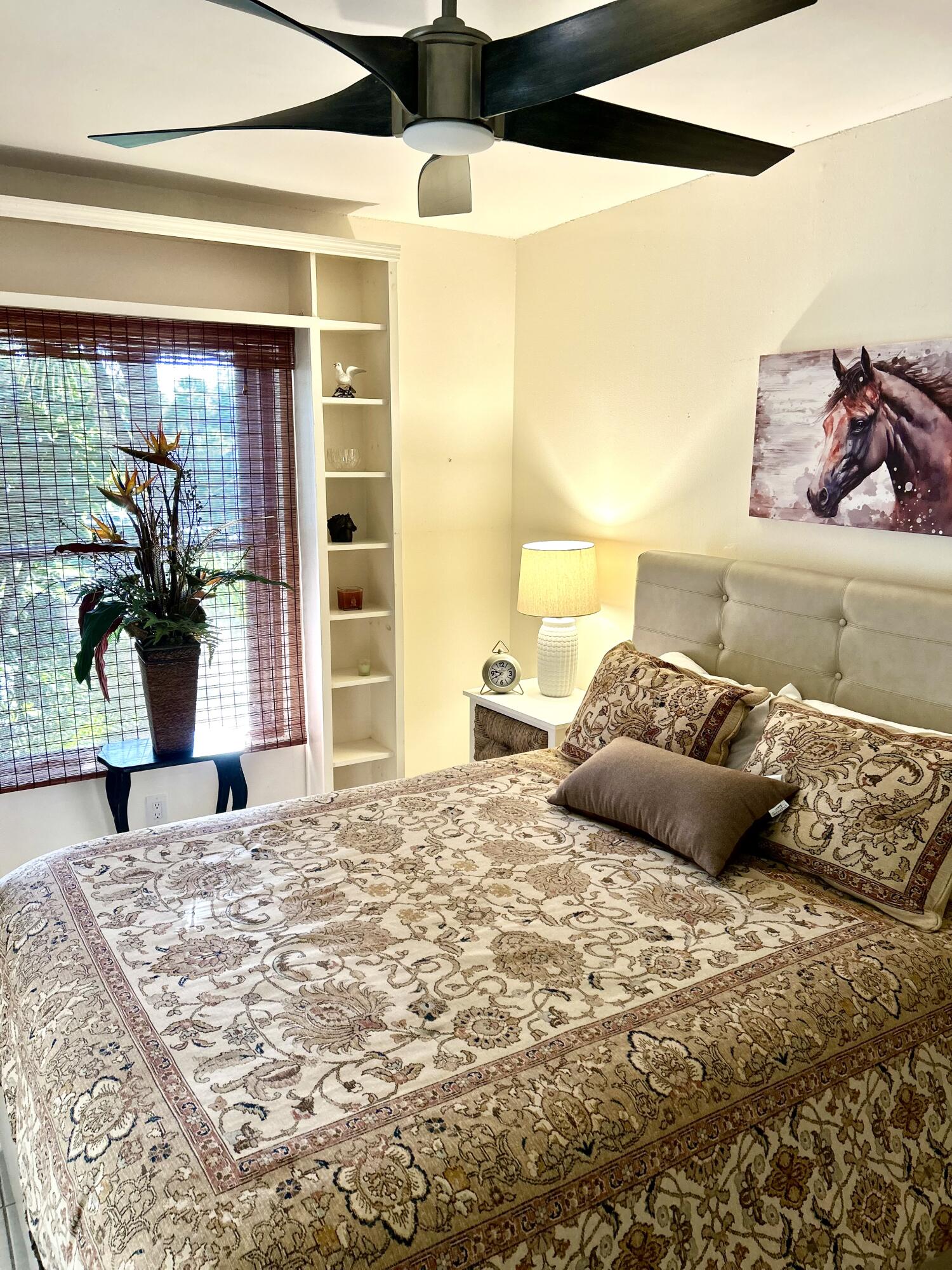 13321 Polo Club Road, Unit C 202 Wellington, FL 33414 - Photo 12 of 20 a bedroom with a large bed and a large window