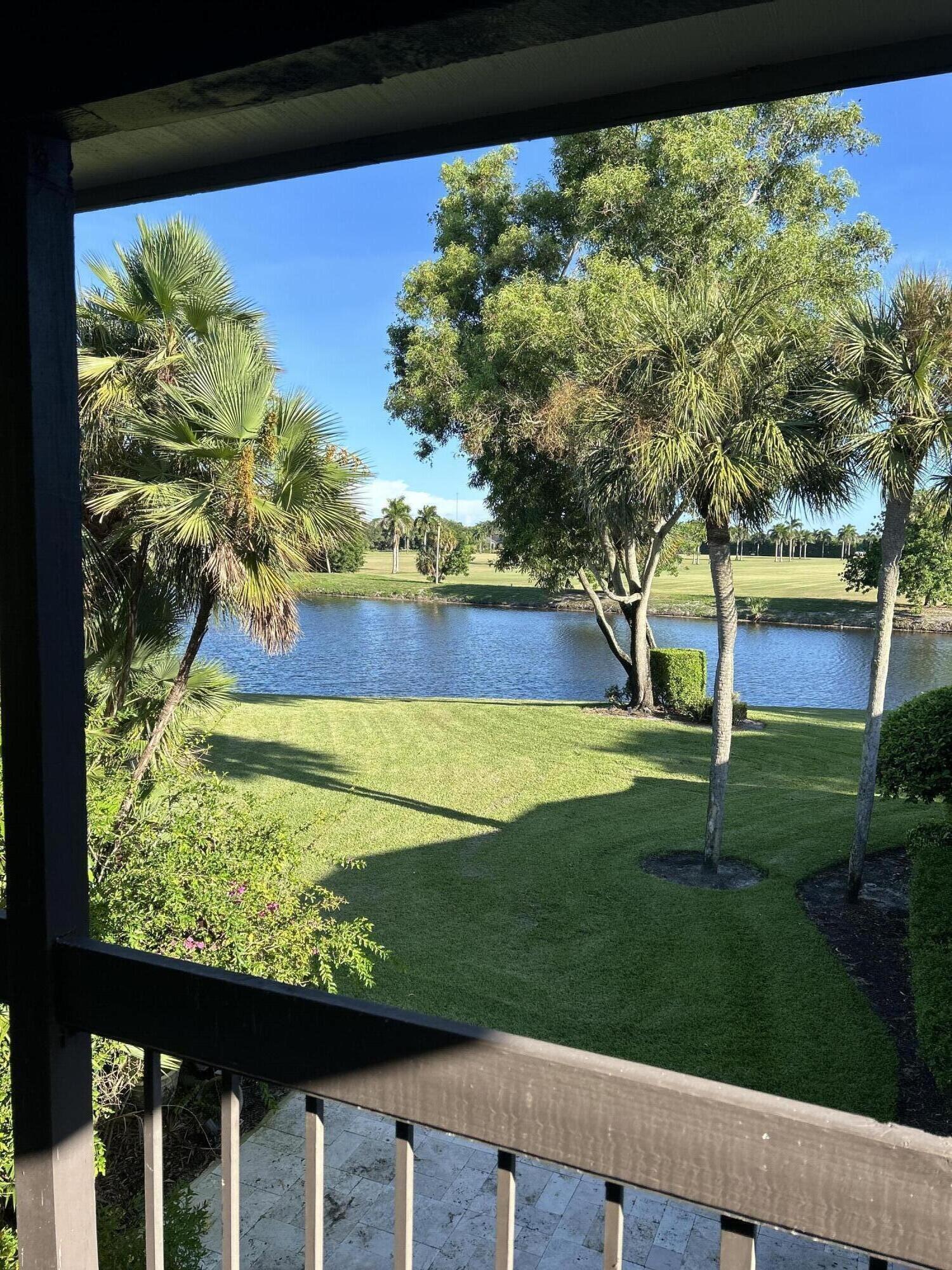 13321 Polo Club Road, Unit C 202 Wellington, FL 33414 - Photo 17 of 20 a view of a yard