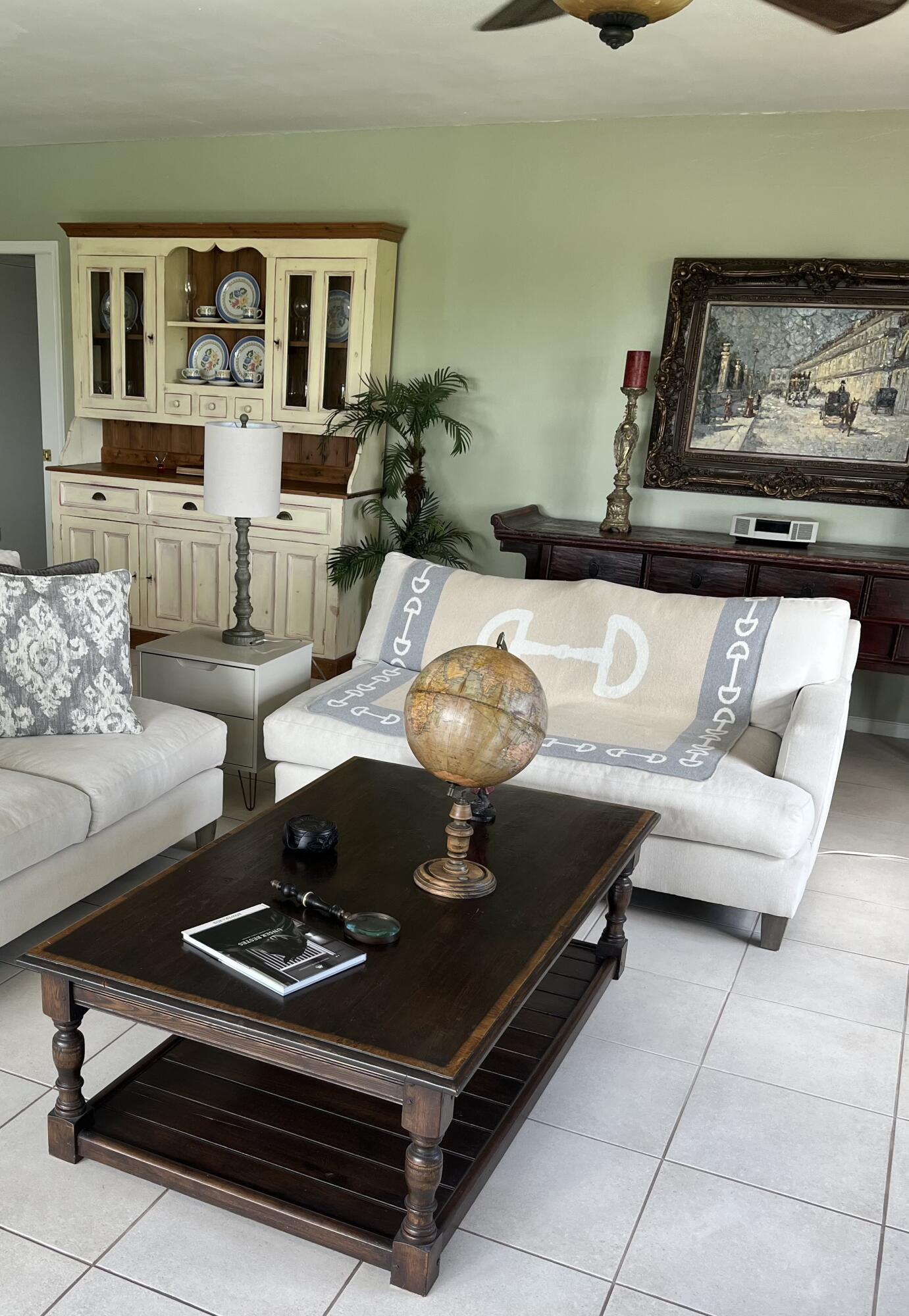 13321 Polo Club Road, Unit C 202 Wellington, FL 33414 - Photo 4 of 20 a living room with furniture and view of kitchen