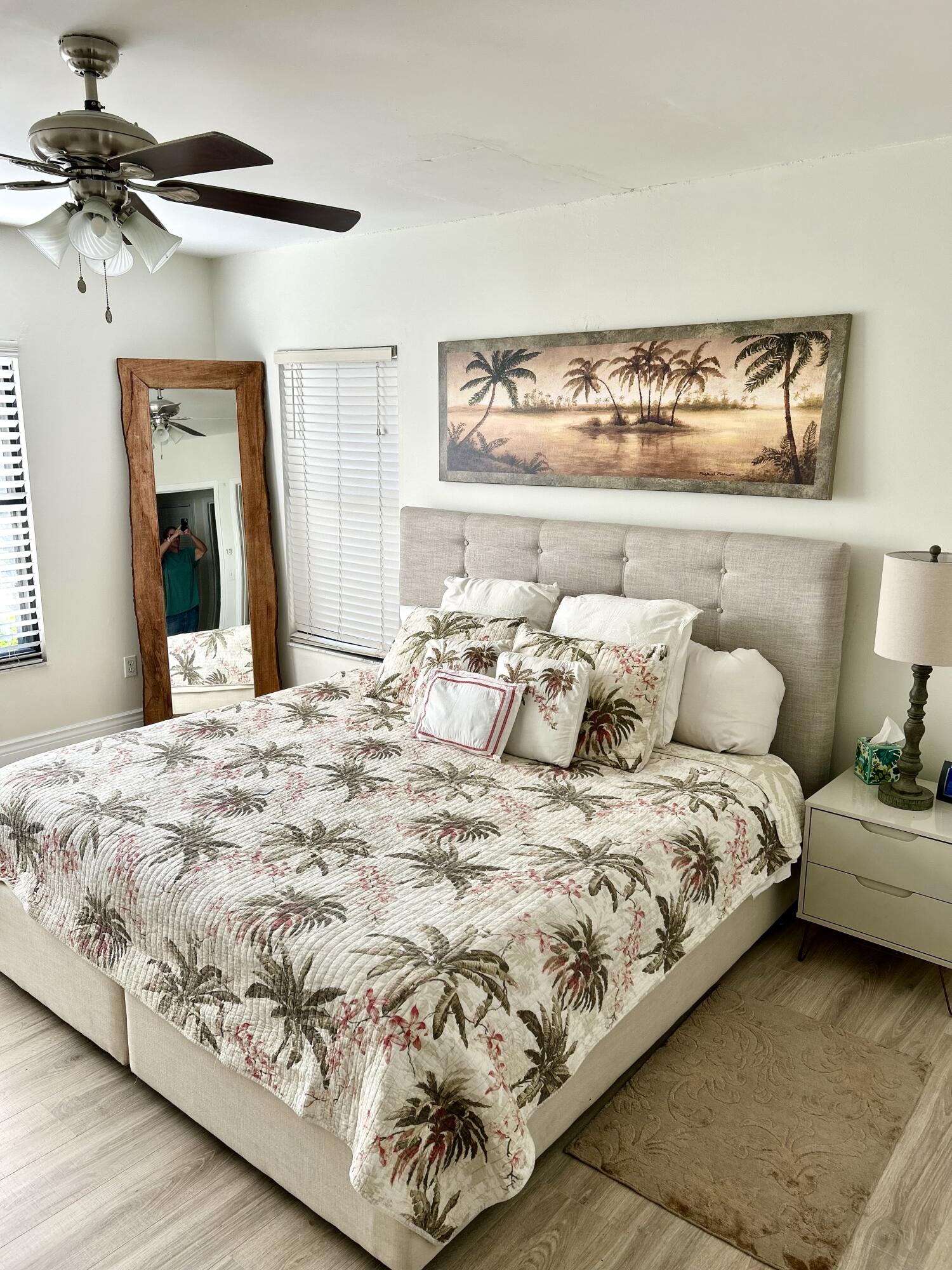 13321 Polo Club Road, Unit C 202 Wellington, FL 33414 - Photo 10 of 20 a large bed sitting in a bedroom and table