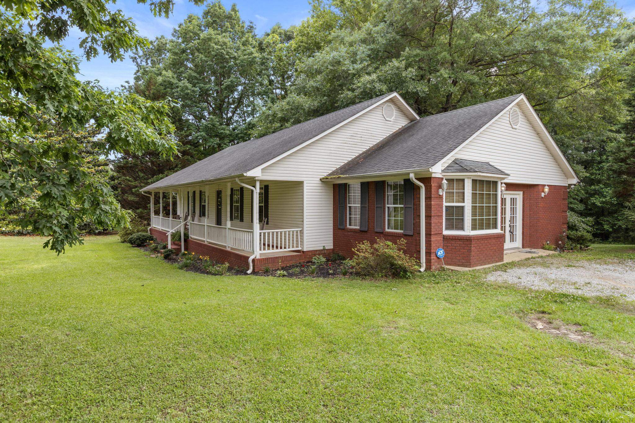 4625 Tucker Road Golden, MS 38847 - Photo 3 of 35 a view of a house with a yard and sitting area