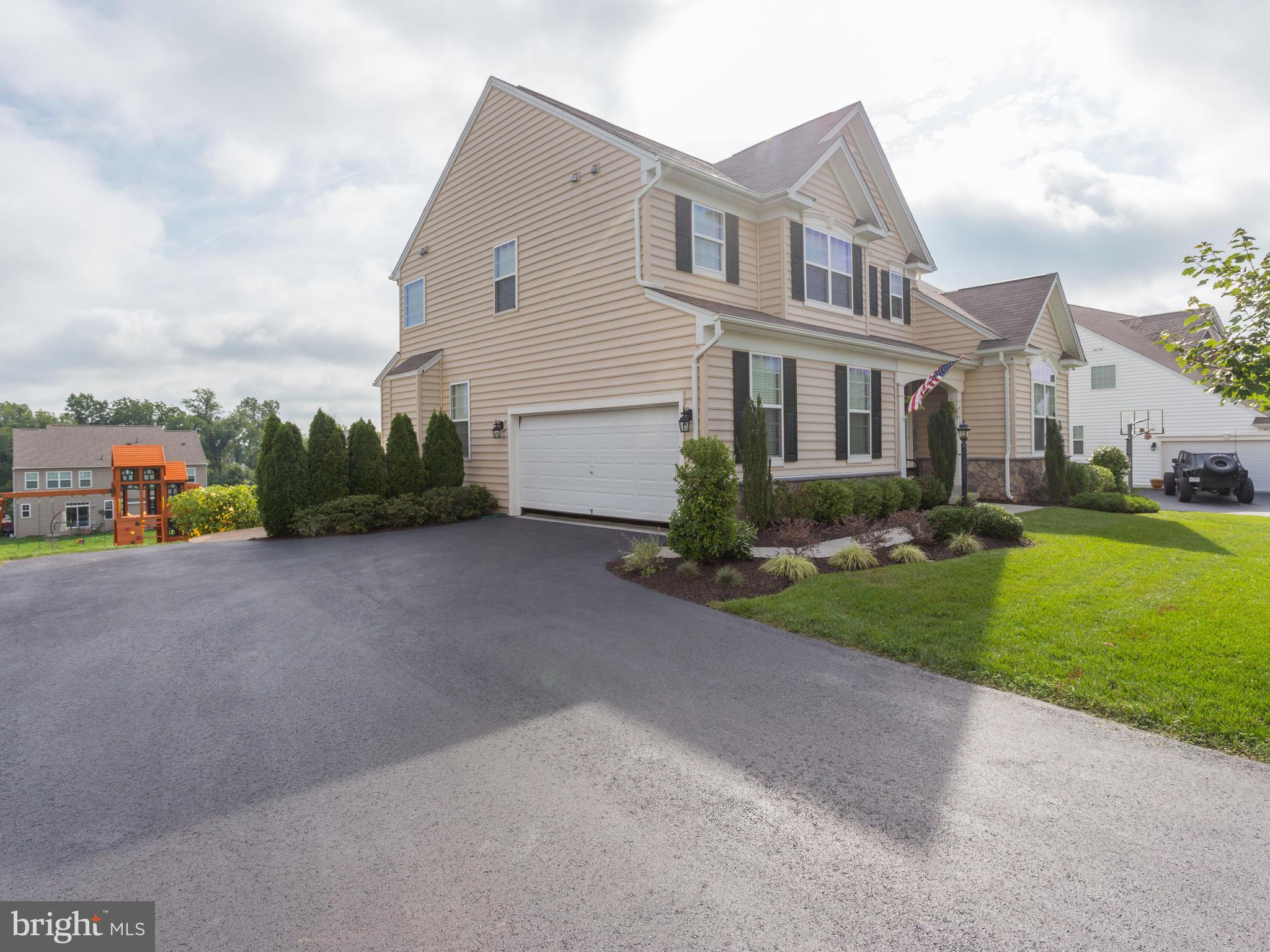 43146 Rocks Way Leesburg, VA 20176 - Photo 2 of 30 Side Load Two Car Garage and oversized driveway