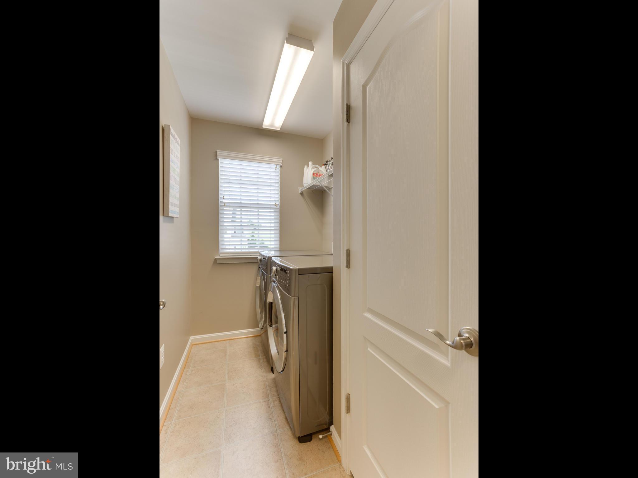 43146 Rocks Way Leesburg, VA 20176 - Photo 24 of 30 Laundry Room w/ Front Load Washer & Dryer