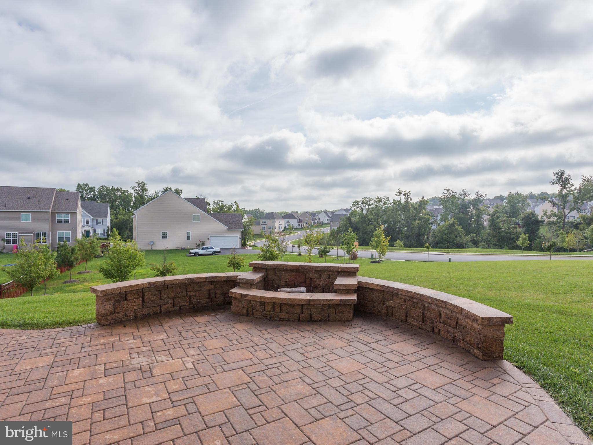43146 Rocks Way Leesburg, VA 20176 - Photo 5 of 30 400SqFt Paver Patio w/ Sitting Wall, Fire Pit