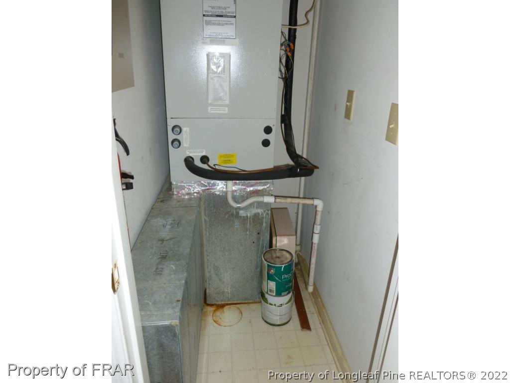 1813 Sardonyx Road Fayetteville, NC 28303 - Photo 20 of 25 a close view of water heater room