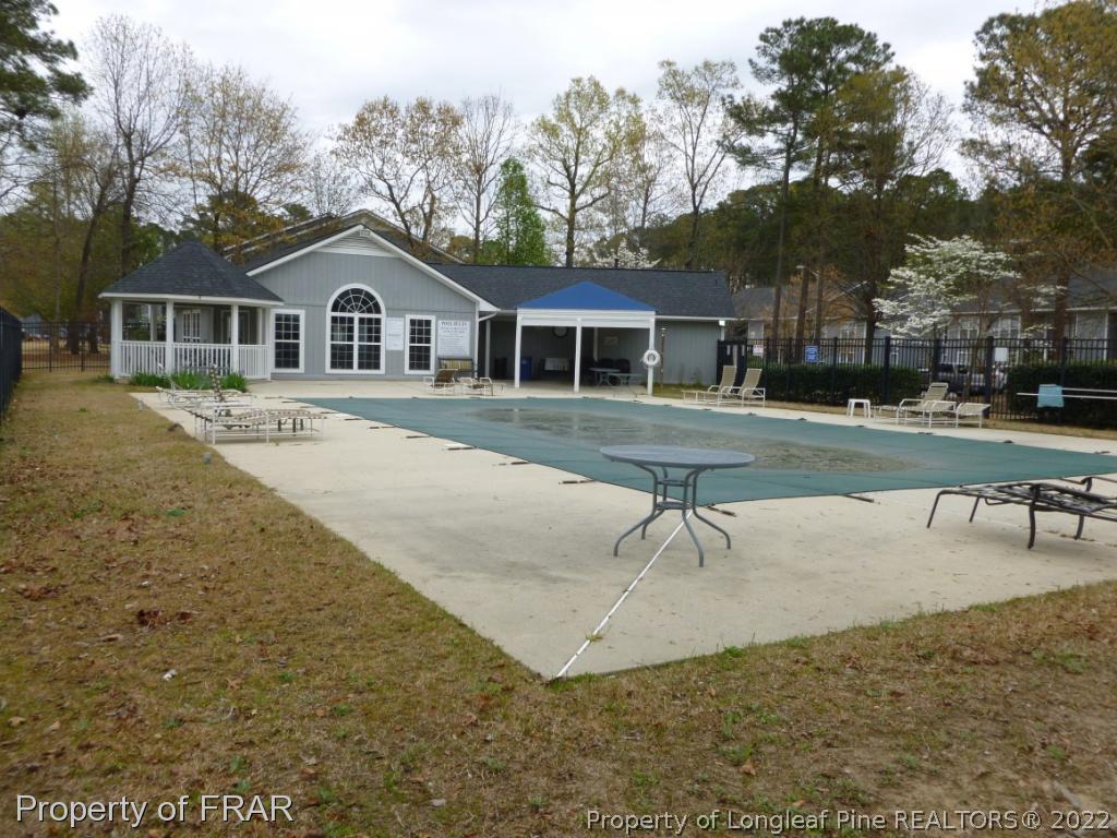 1813 Sardonyx Road Fayetteville, NC 28303 - Photo 22 of 25 a front view of a house with a yard