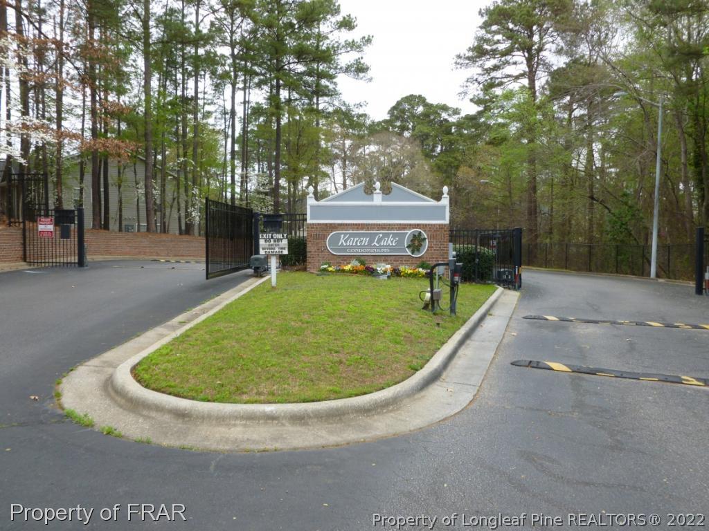 1813 Sardonyx Road Fayetteville, NC 28303 - Photo 24 of 25 a view of a swimming pool with a garden
