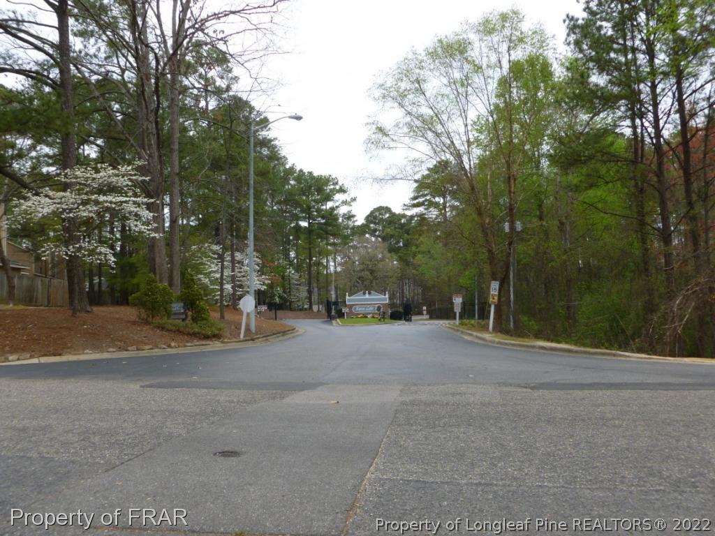1813 Sardonyx Road Fayetteville, NC 28303 - Photo 25 of 25 a view of a house with a yard and tree s