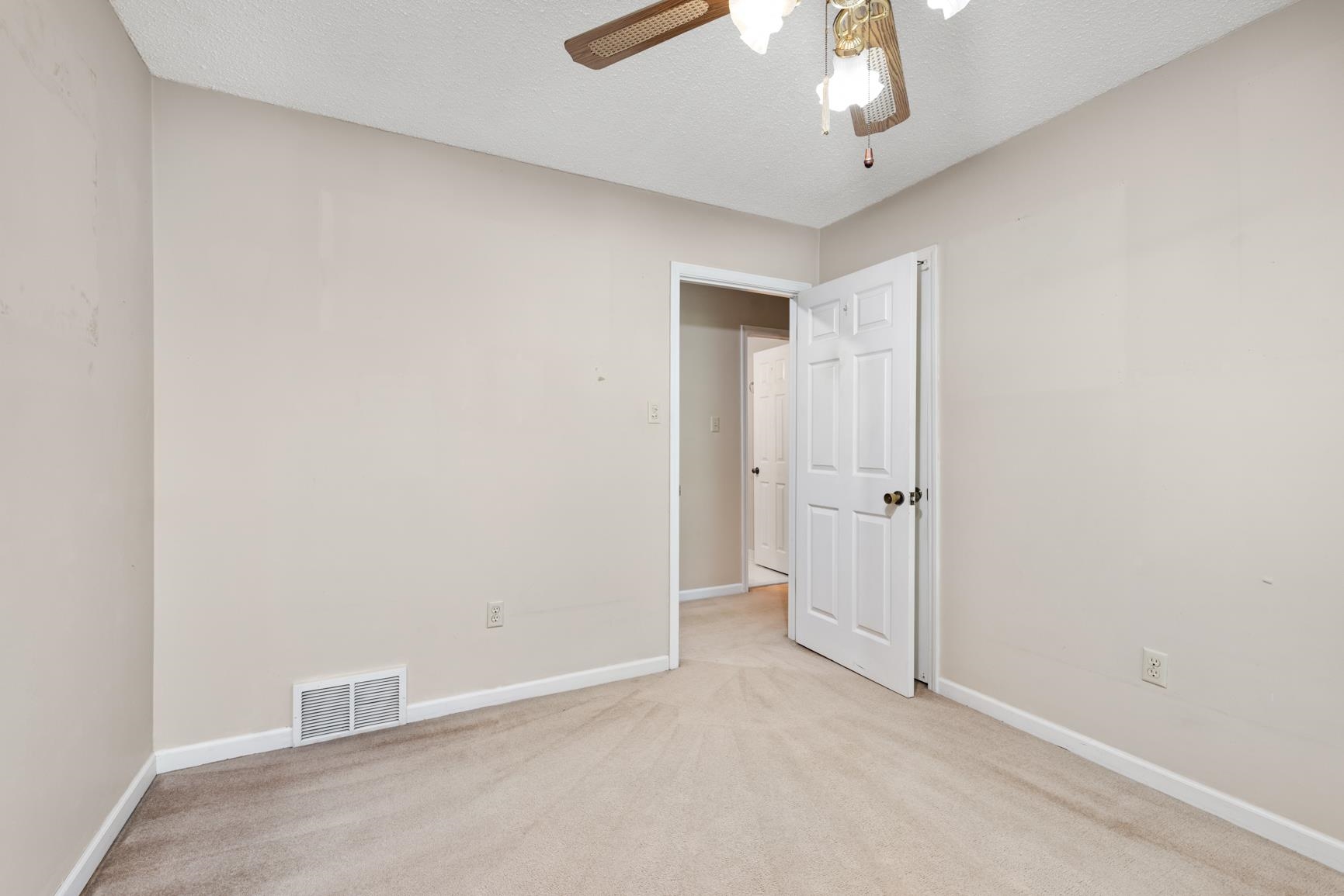 5015 Eagles Nest Lane Bartlett, TN 38002 - Photo 20 of 39 Spare room with ceiling fan and light colored carpet