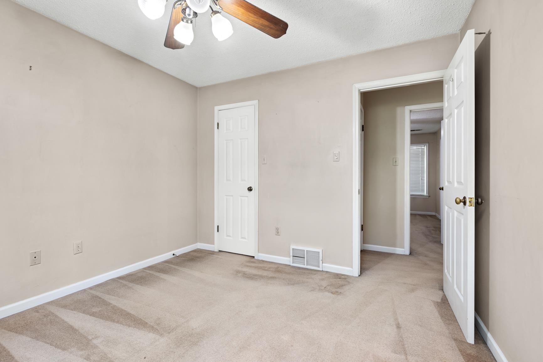 5015 Eagles Nest Lane Bartlett, TN 38002 - Photo 23 of 39 Unfurnished bedroom featuring light carpet and ceiling fan