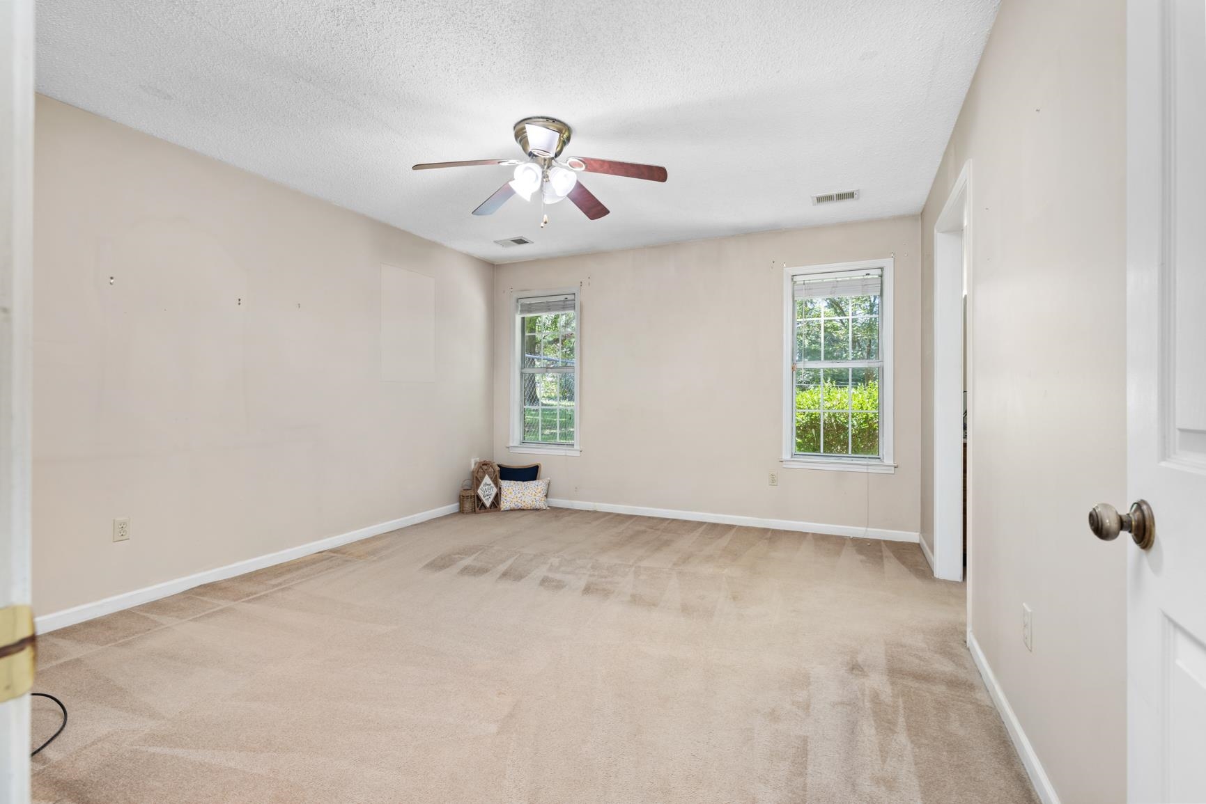5015 Eagles Nest Lane Bartlett, TN 38002 - Photo 24 of 39 Unfurnished room with a ceiling fan, carpet floors, and a textured ceiling